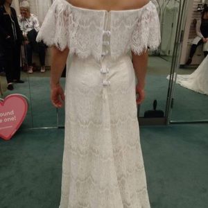 Wedding dress from David’s Bridal Boho style size 6 and is ivory in color